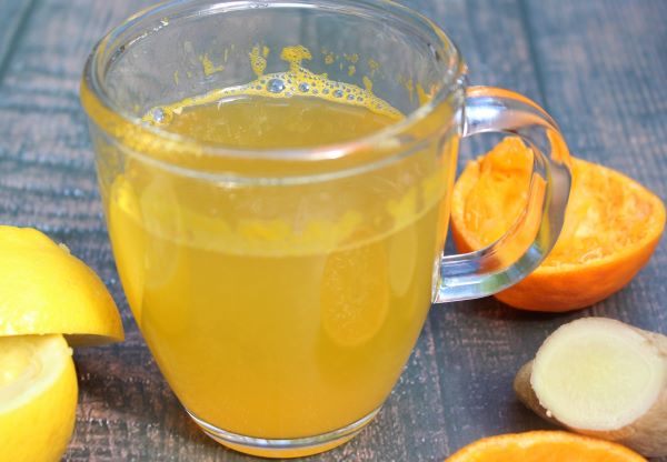 Sip Your Way to a Flatter Stomach: A Refreshing Carrot, Lemon, and Ginger Drink