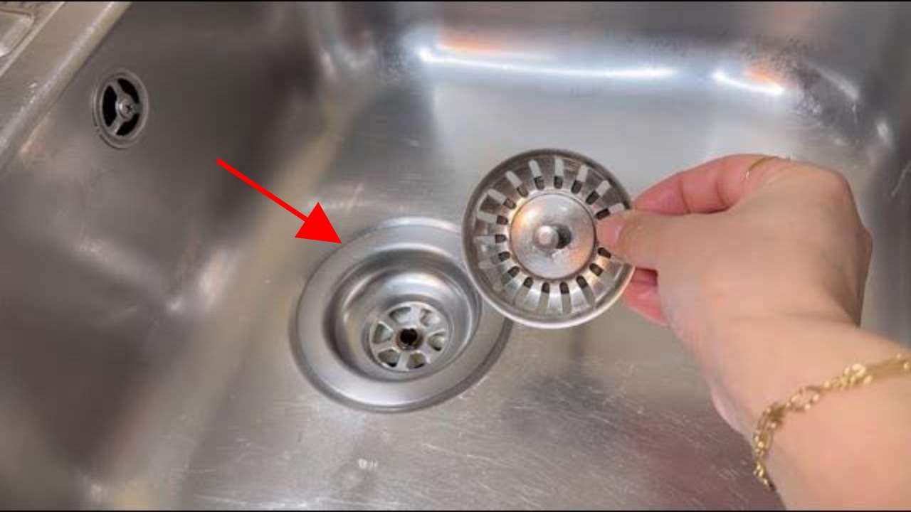 Unlock the Secret to a Clog-Free Sink with This Brilliant Feature!